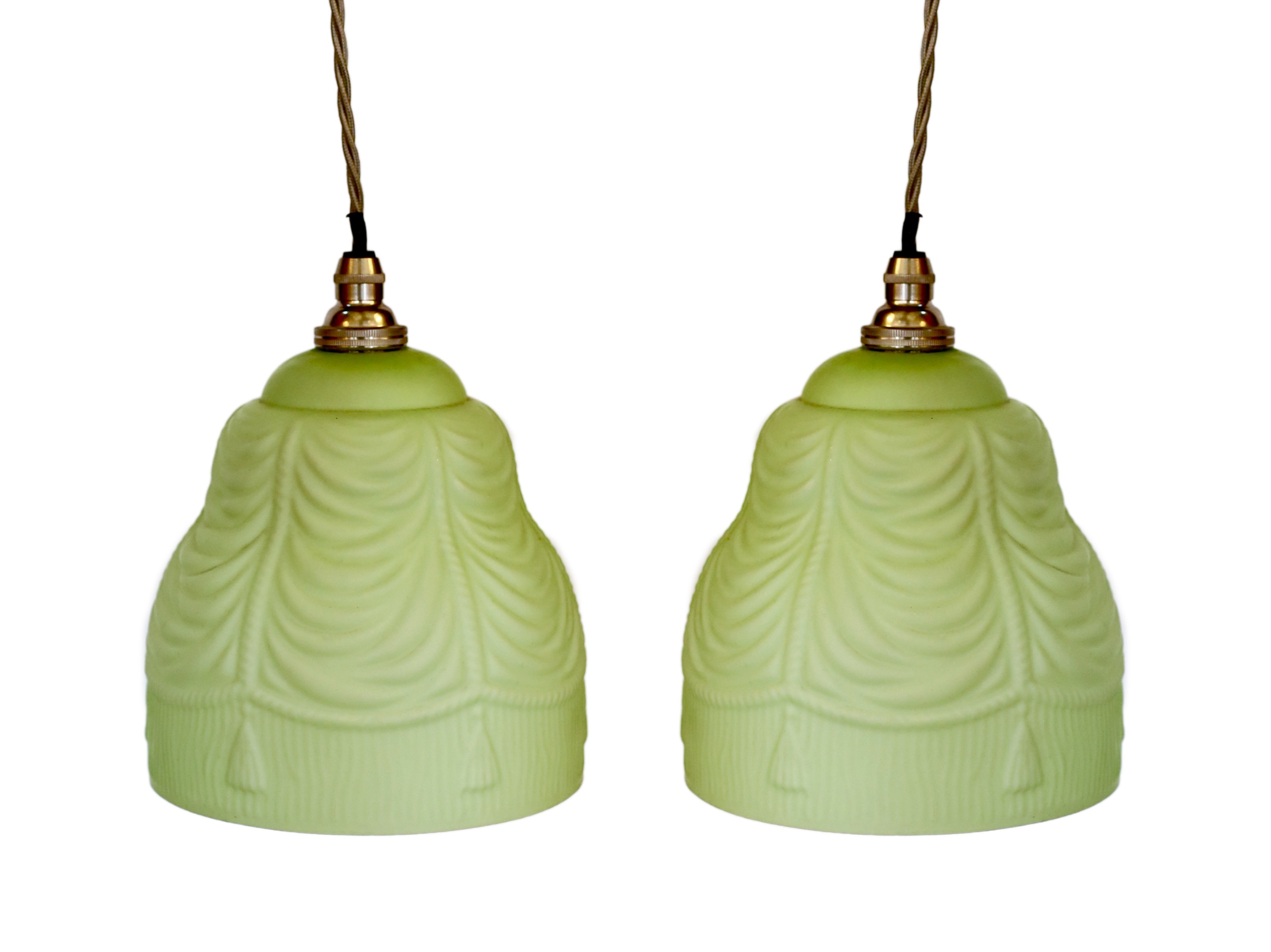 A pair of 1930s frosted green paint glass lampshades with pendant fittings, height 19cm, width 15cm